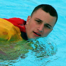 lifeguards swims in anorak