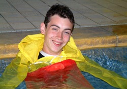 lifeguard with anorak in pool